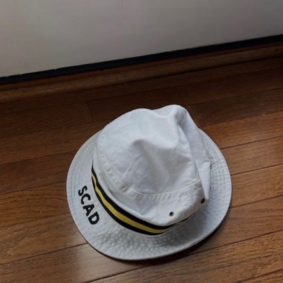 Legacy Accessories - SCAD bucket hat in white and black and yellow